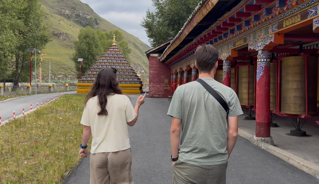 A corridor of prayer wheels in the Muya area