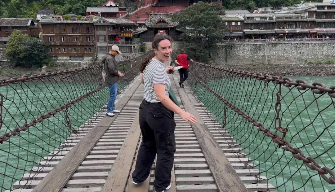 Eva crossing Luding Bridge on the return journey